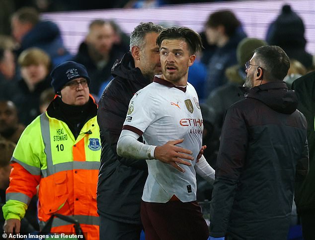 Grealish looks back at the pitch as he heads towards the players' tunnel at Goodison Park to return home on Boxing Day