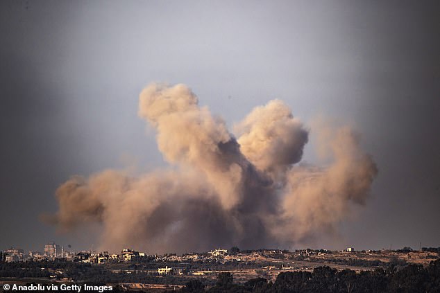 Smoke rises from residential area in Gaza, seen from Nahal Oz, as Israeli attacks continue in Nahal Oz