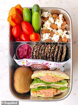 Susie shared some tasty and healthy lunch box ideas.  In one of them she grabbed a salmon sandwich and salad with crackers and dip, vegetables, popcorn and almonds and a kiwi