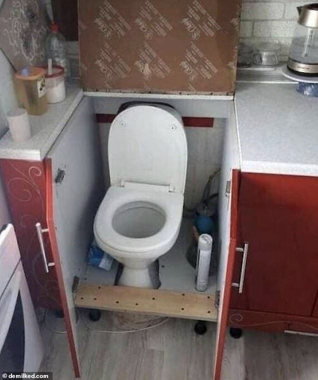 Foreign!  Elsewhere, in a bizarre renovation, another contractor has installed a toilet in a cupboard - conveniently within easy reach of the kettle