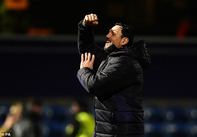 Their manager Erol Bulut celebrated on the pitch after claiming victory at Loftus Road