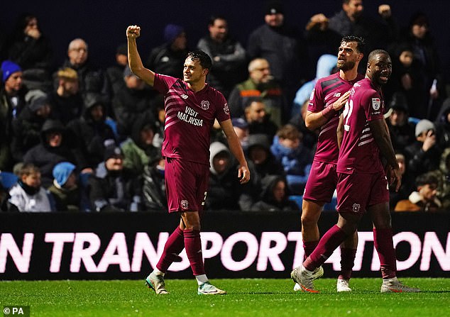 Perry NG (L) also scored from a corner to seal the win for Cardiff City in the 74th minute