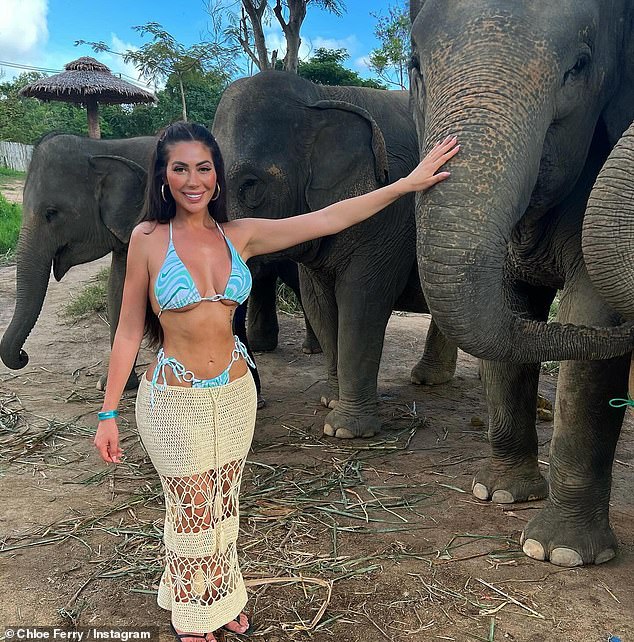 Chloe kept her followers updated during her holiday, donning a blue patterned bikini for a trip to Elephant Kingdom Sanctuary on Koh Samui on Saturday