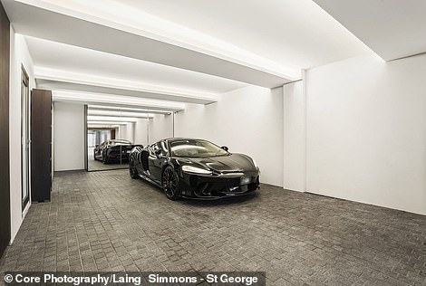 Another impressive feature of the five-bedroom house is the James Bond-style garage, which can accommodate three cars and has floor-to-ceiling mirrors to increase the space.