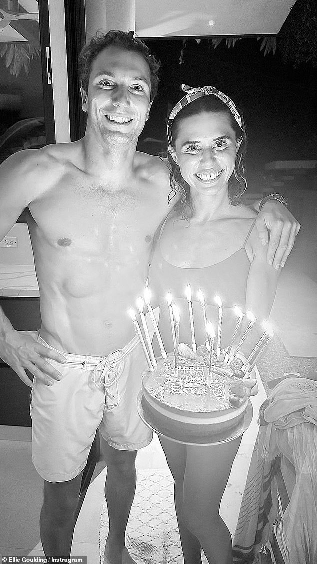 Ellie, who celebrated her birthday on December 30, also uploaded a photo of her two friends holding a large cake with candles