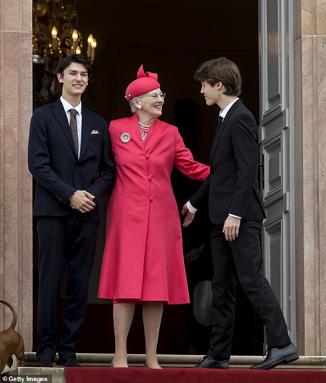 Queen Margrethe of Denmark at the main entrance of Frederiksborg Palace, welcoming her grandchildren, Prince Felix and Prince Nikolai, on the occasion of Prince Christian's confirmation on May 15, 2021 in Fredensborg