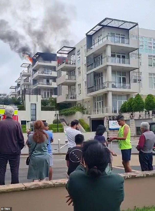 Hundreds of residents were forced to evacuate the apartment complex (pictured), many reporting the sound of an explosion and 