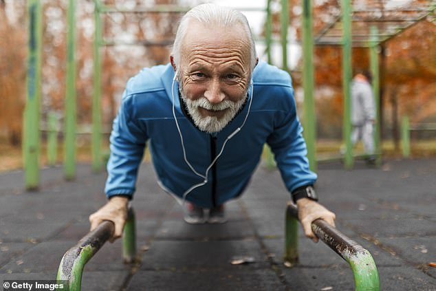 Perform a standard push-up – lie on your stomach, balancing on your hands, with arms straight and legs in line with your back – then bend your elbows to lower your chest and push yourself back up (file image)