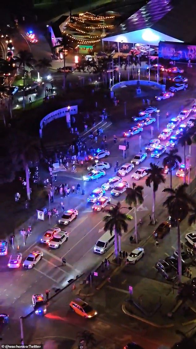 Video footage from helicopters flying over the scene showed at least 60 police cars, with lights flashing, responding to the scene