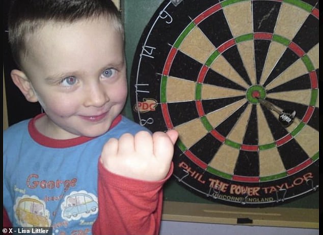 The youngster celebrates hitting the bullseye as a young child in a snap posted by mother Lisa