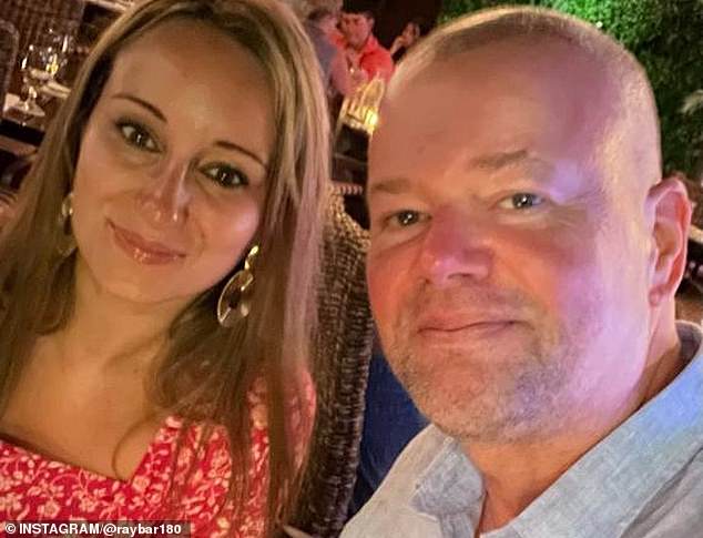 Raymond van Barneveld (right) married his wife Julia (left) last year before reaching the last 16 of the World Championship