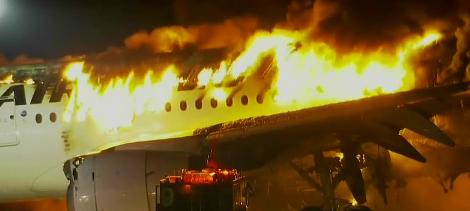 Shocking footage showed the Japan Airlines plane engulfed by a raging fire as it stood on the runway of Haneda Airport in Ota City, Tokyo, as flames poured from the passenger windows