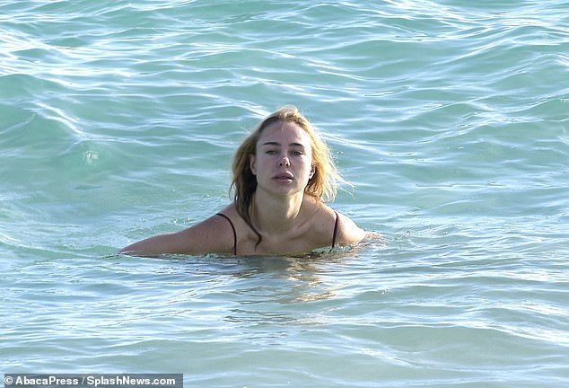 Kimberley cooled off in the Caribbean sun as she enjoyed a dip in the sea and showed off her natural, makeup-free complexion