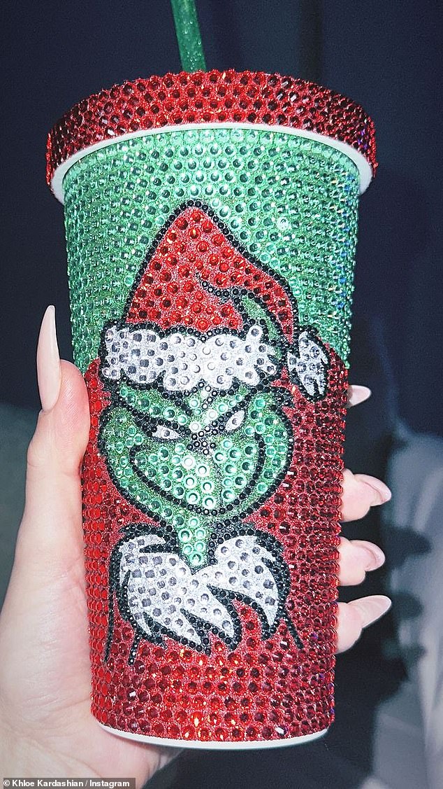 Khloe shared a fun, bedazzled cup she had – with the Grinch