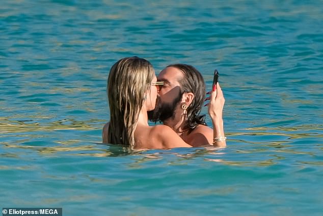 The German-born catwalk beauty, 50, also enjoyed a steamy make-up session with husband Tom Kaulitz, 34, in the water