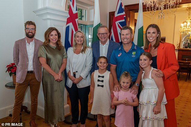 Prime Minister Anthony Albanese (pictured center with Warner and his family, right, at Kirribilli House on Monday) has now become involved in the hunt for the missing caps