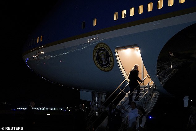 Biden boards Air Force One on his way back to Washington, DC