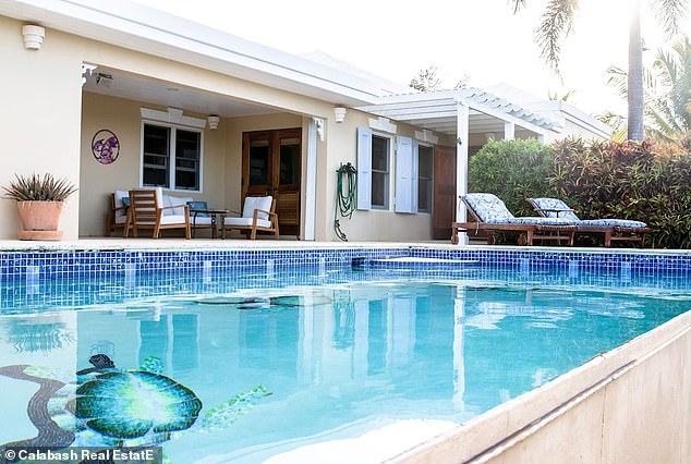 The villa the Bidens stayed in has a tiled infinity pool