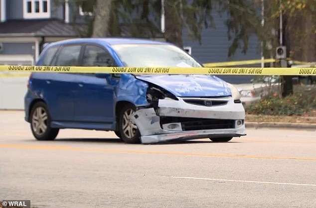 The blue Honda Fit Everett that was driving has damage to the right front side and a cracked windshield.  Everett claimed the girl jumped in front of him and called her a “r*tard.”