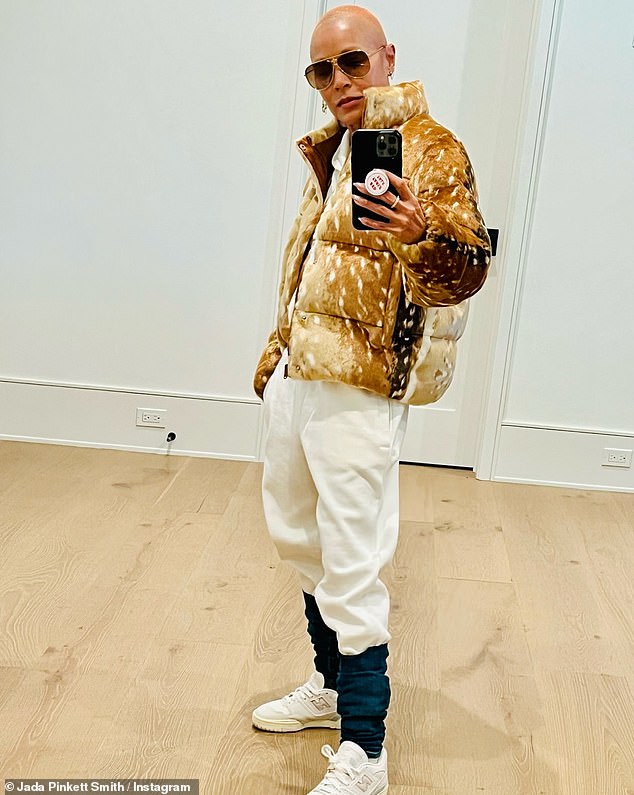 The actress shared a selfie on her Instagram on Tuesday in which she rocked aviators, a deer print puffer jacket and white sweatpants with black leg warmers.