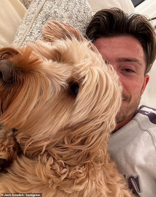 The 28-year-old footballer shared a photo of himself looking relaxed with his dog on Sunday and revealed his devastation over the 'traumatic' incident that left his loved ones terrified