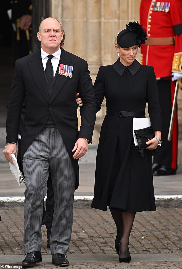 Zara turned to her favorite designer Laura Green and wore a black coat dress with a fit-and-flare skirt, high-neck silk collar and a matching silk belt.