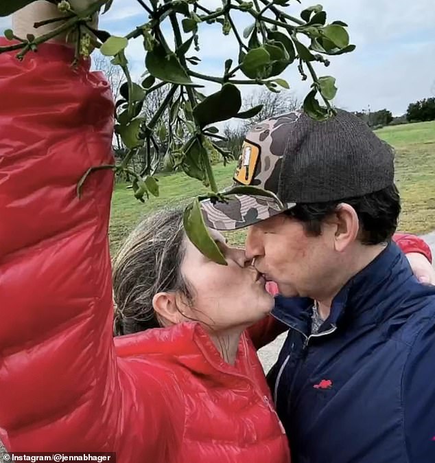 The former first daughter shared a photo of herself affectionately kissing her husband under a mistletoe in Texas