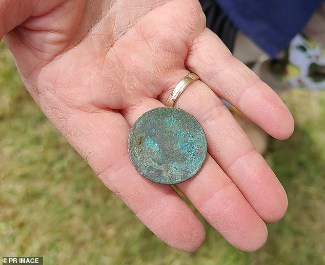 The dig also unearthed numerous buried treasures, including an 1827 coin (pictured), jewelry and trinkets and a significant number of buttons and a clay smoking pipe.