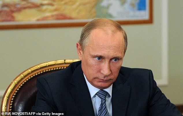 Russian President Vladimir Putin attends a meeting at his Novo-Ogaryovo residence outside Moscow