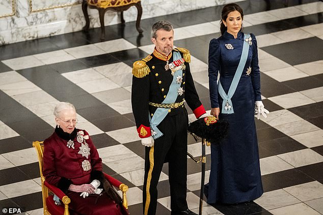 Mary opted for a navy blue dress with a high neck, while Frederik wore his military uniform