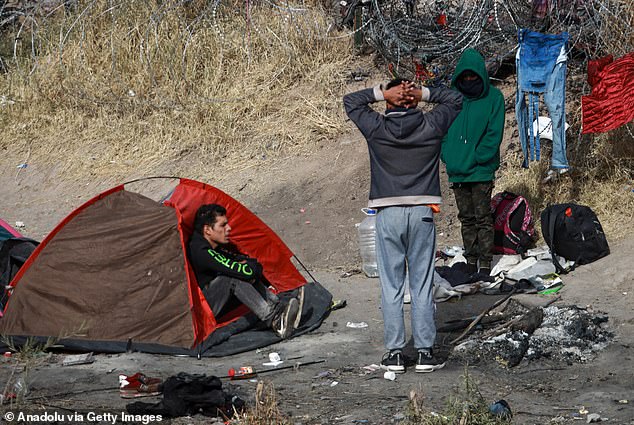 Migrants set up camp in the Rio Bravo earlier this week as they tried to enter the US