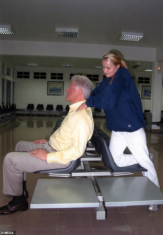 Among those on the list is Bill Clinton, who is mentioned at least 50 times, according to ABC.  He receives a neck massage from Chauntae Davies, a then 22-year-old massage therapist.  The photo was taken in Portugal in 2002