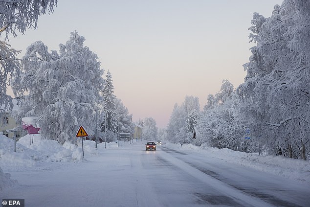 In Kvikkjokk-Årrenjarka in Swedish Lapland, the mercury fell to minus 43.6 C (minus 46.5 F), the coldest temperature in the country in January since 1999. In the municipality of Kiruna, in northern Sweden (pictured), the temperature -38.9.  degrees Celsius in the morning