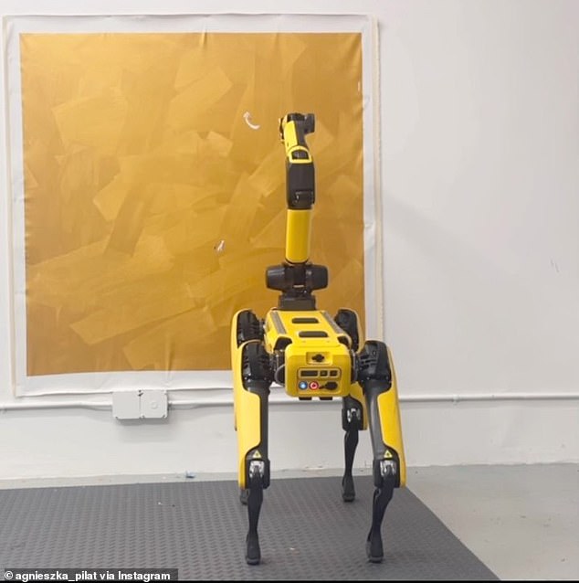 Robotic dogs are trained using artificial intelligence to hold a paintbrush and create works of art autonomously