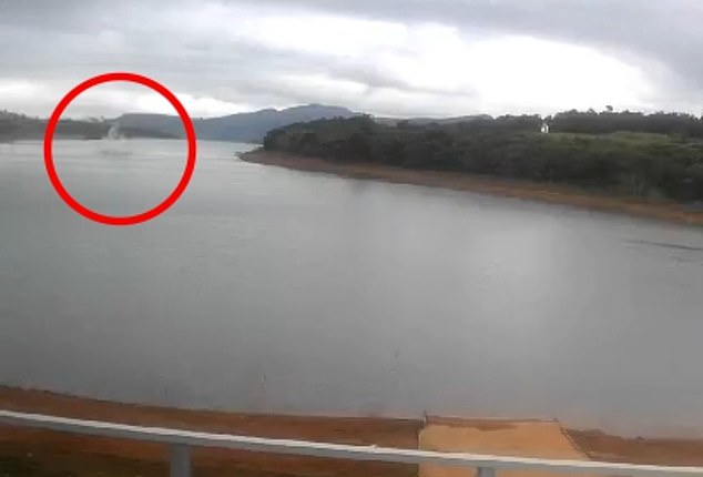 A surveillance video camera set up on a farm captured the moment the helicopter crashed into a lake in Espírito Santo, Brazil, on Tuesday morning