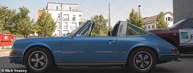 ¿ Slide me ¿ Veasey worked for five years on a project that included scanning multimillion-dollar vintage cars.  The photo shows a Porsche 911 Targa