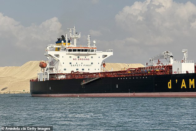 A cargo ship crosses the Suez Canal, one of the most critical man-made waterways, in Ismailia, Egypt on December 29, 2023