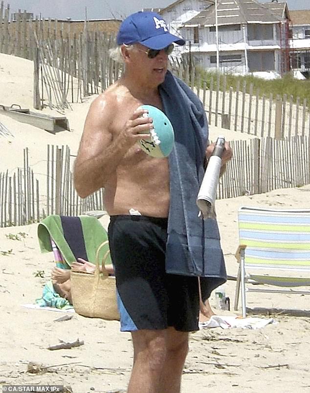 President Biden had the lesion removed from his chest during his physical - above Biden on the beach in May 2009