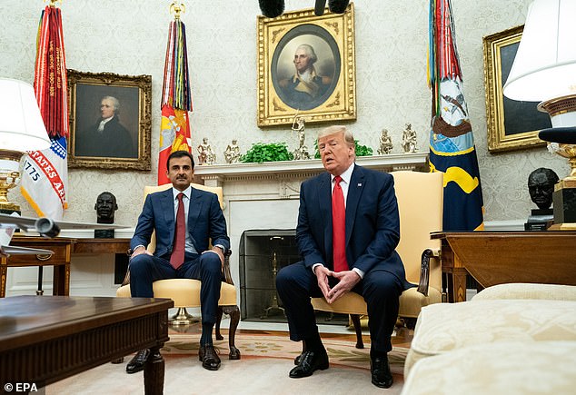 US President Donald J. Trump speaks during a meeting with Qatar's Emir Sheikh Tamim Bin Hamad Al-Thani, in the Oval Office of the White House in Washington, DC, US, on July 9, 2019