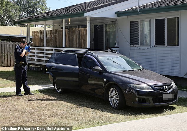 The inquest will determine what child safety officers could have done differently (photo: an officer photographing the car)