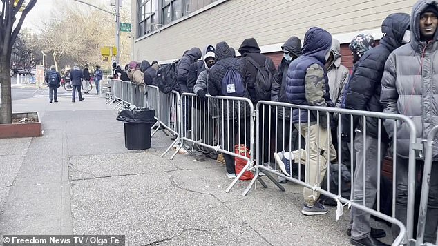 1704329673 766 Migrants queue for blocks around the East Village to get