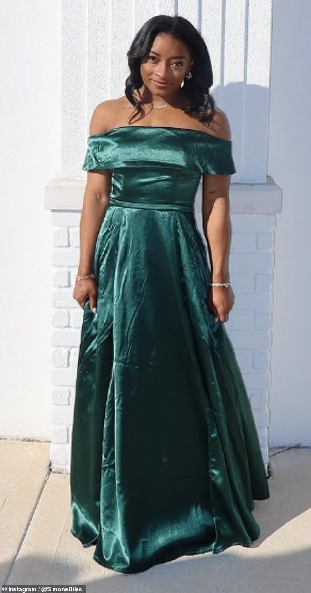 Simone wore a royal green dress and accessorized the satin gown with an array of silver accessories, including a necklace that paid tribute to 28-year-old husband Jonathan Owens