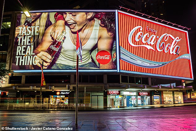 The once famous nightlife destination of Kings Cross racked up 723 violations among its 18,187 residents (pictured, iconic Coco-Cola sign at Kings Cross, Sydney)