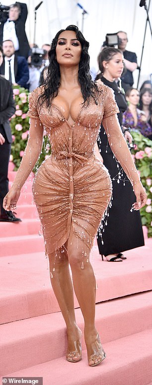 Kanye had previously criticized Kim for being 'overly sexualised', targeting her SKIMS brand and also claiming the wetlook Thierry Mugler dress she wore to the 2019 Met Gala (pictured) was 'too sexy'.