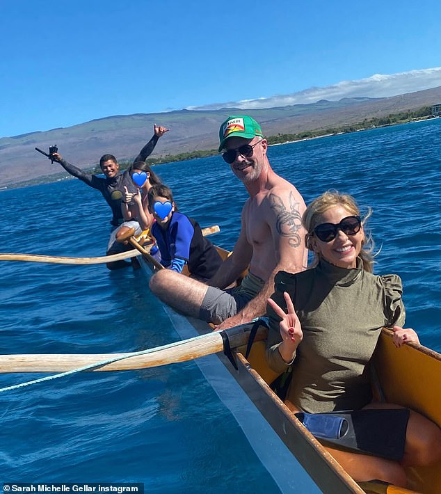 The family also enjoyed a kayaking trip, with Freddie showing off his toned figure in just a pair of shorts and a green hat