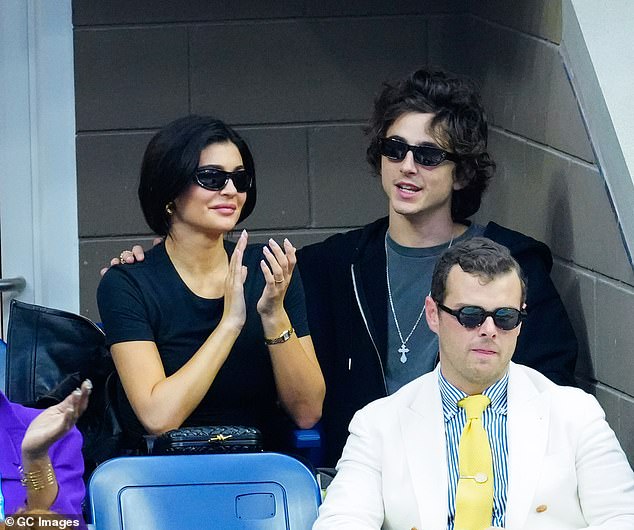 Kylie sipped her drink while Timothee had a protective arm around her shoulders;  the Dune actor occasionally moved his hand lower to her upper back