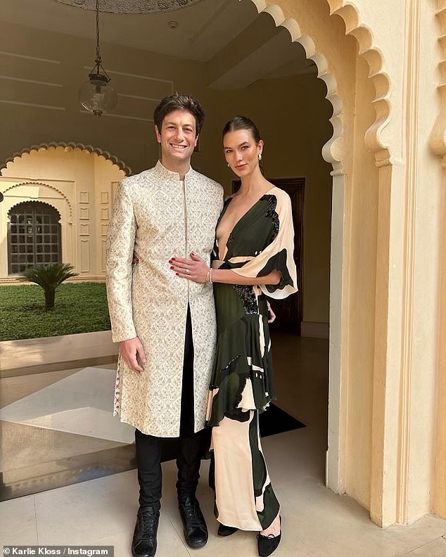 Karlie happily shared some other fantastic snaps from the couple's trip.  In one, they posed together, with Joshua wearing a traditional Indian kurta set