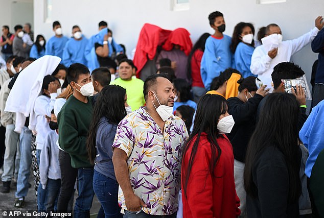 Guatemalan migrants (pictured) are seen at the air base in Guatemala on Wednesday after being deported from the United States.  It is the first flight of deportees in the country in 2024