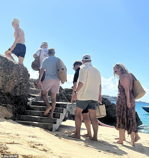 The group stays on a luxury yacht and heads to the beach at Meads Bay on the Caribbean island to soak up the sun