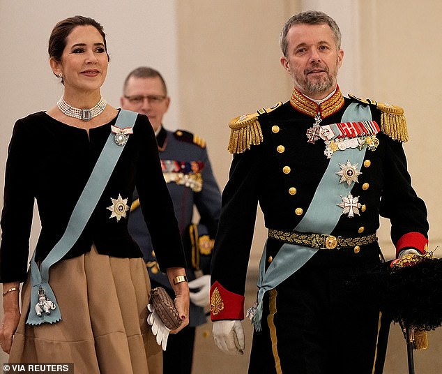 Walking side by side, the royal couple appeared in good spirits as they entered the event at Christiansborg Castle